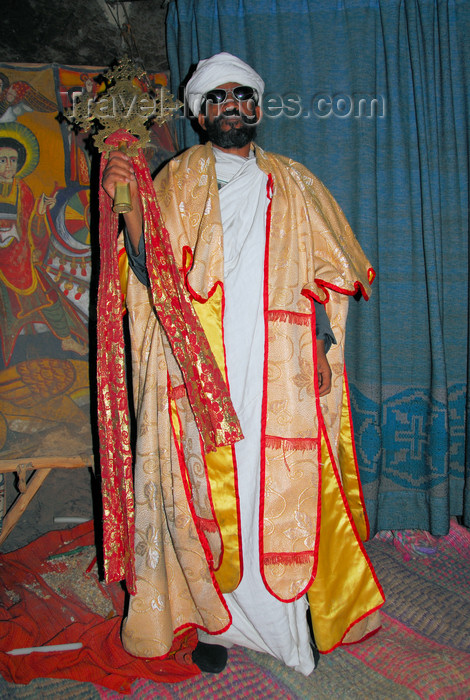 ethiopia169: Lalibela, Amhara region, Ethiopia: Bet Maryam rock-hewn church - priest holding a cross - Ethiopian Orthodox Tewahedo Church - photo by M.Torres - (c) Travel-Images.com - Stock Photography agency - Image Bank