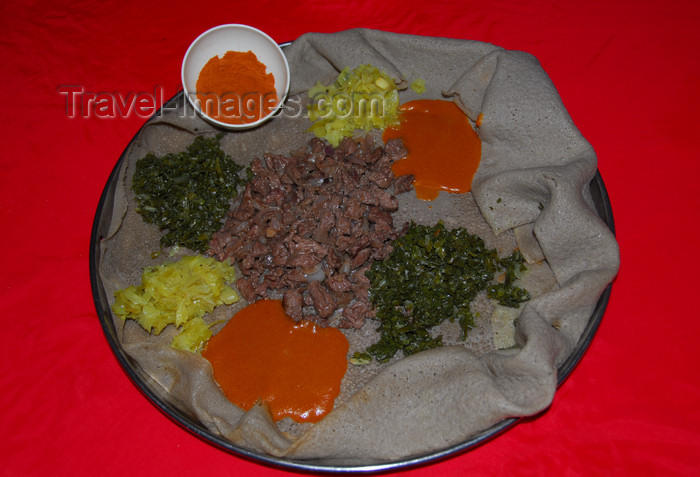 ethiopia195: Lalibela, Amhara region, Ethiopia: injera with kifto meat and vegetables - bread made of teff flour, typical of Ethiopian cuisine - photo by M.Torres - (c) Travel-Images.com - Stock Photography agency - Image Bank