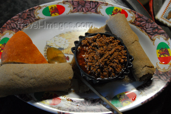 ethiopia207: Gondar, Amhara Region, Ethiopia: injera with meat - Ethiopian food - photo by M.Torres - (c) Travel-Images.com - Stock Photography agency - Image Bank