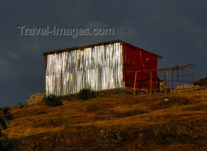 ethiopia233: Gondar, Amhara Region, Ethiopia: zinc hut shinning in the last sun rays - photo by M.Torres - (c) Travel-Images.com - Stock Photography agency - Image Bank