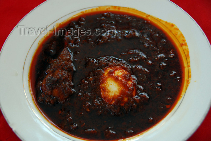 ethiopia413: Bahir Dar, Amhara, Ethiopia: doro wat - chicken and egg stew in hot sauce - Ethiopian cuisine - photo by M.Torres - (c) Travel-Images.com - Stock Photography agency - Image Bank