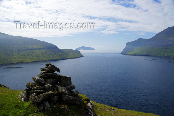 faeroe83: Sørvágsfjørður fjord, Vágar island, Faroes: cairn on the cliff edge - photo by A.Ferrari - (c) Travel-Images.com - Stock Photography agency - Image Bank