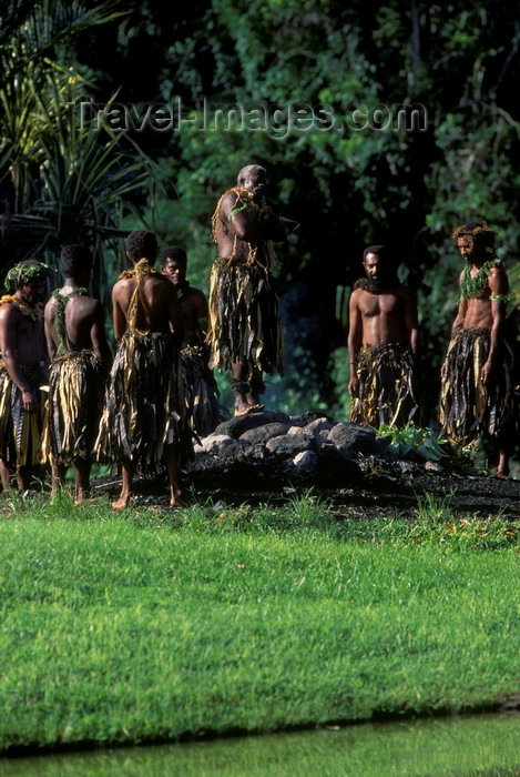 fiji5: Pacific Harbor, Viti Levu, Fiji: traditional Fijian firewalkers of Beoa in costume walking on fire at Pacific Harbor Cultural Center - photo by C.Lovell - (c) Travel-Images.com - Stock Photography agency - Image Bank