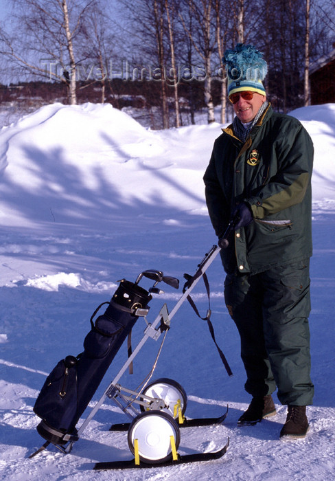 fin112: Finland - Lapland - Rovaniemi - Arctic golfer in the snow - Arctic images by F.Rigaud - (c) Travel-Images.com - Stock Photography agency - Image Bank