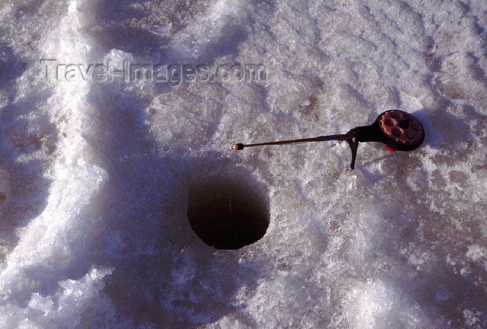 fin114: Finland - Lapland - Rovaniemi - fishing in the ice - Arctic images by F.Rigaud - (c) Travel-Images.com - Stock Photography agency - Image Bank