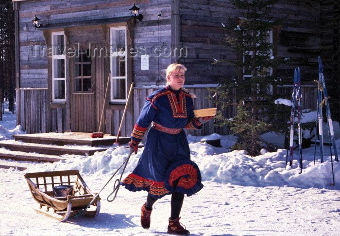 fin59: Finland - Levi: Sami farm - girl with sledge (photo by F.Rigaud) - (c) Travel-Images.com - Stock Photography agency - Image Bank