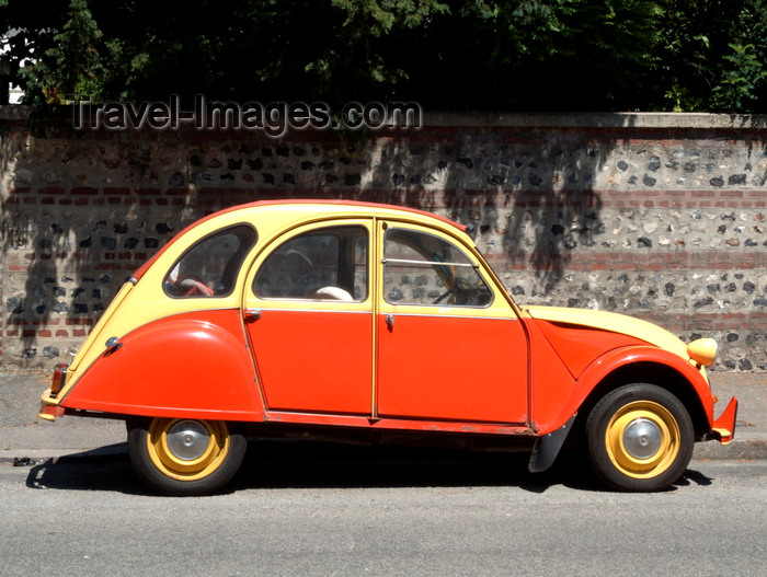 france1374: Le Havre, Seine-Maritime, Haute-Normandie, France: red and yellow Citroen 2CV against and old wall - 'deux chevaux' - Normandy - photo by A.Bartel - (c) Travel-Images.com - Stock Photography agency - Image Bank