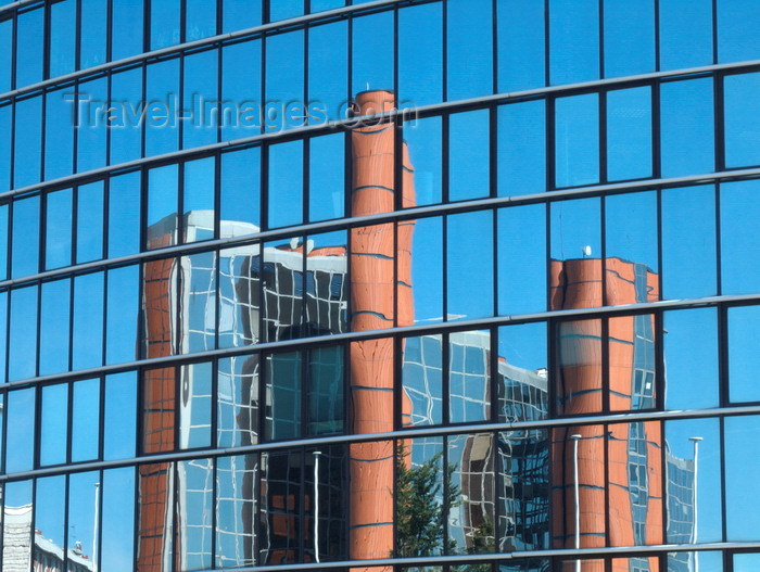 france1385e: Le Havre, Seine-Maritime, Haute-Normandie, France: International Trade Centre reflected in the glass facade of the CMA GGM building - photo by A.Bartel - (c) Travel-Images.com - Stock Photography agency - Image Bank