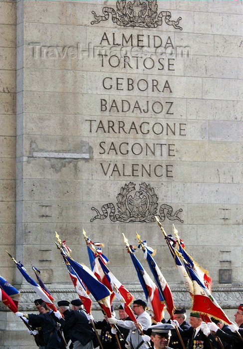france141: France - Paris: parade - anciens combatants - war veterans march with flags at the Arc de Triomphe - Almeida to Valencia - photo by K.White - (c) Travel-Images.com - Stock Photography agency - Image Bank