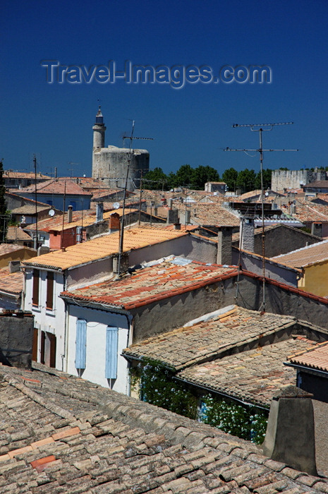 france453: France - Languedoc-Roussillon - Gard - Aigues-Mortes - view over the roof tops towards Tour de Constance - photo by T.Marshall - (c) Travel-Images.com - Stock Photography agency - Image Bank