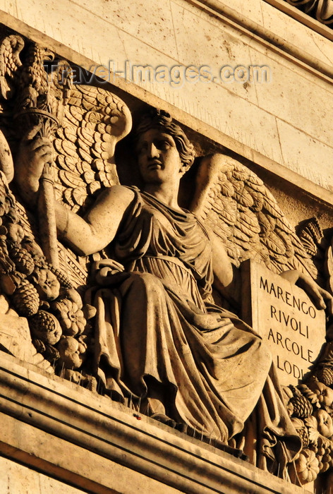 france563: Paris, France: Arc de Triomphe - Place Charles de Gaulle - archangel with shield listing battles - Marengo, Rivoli, Arcole, Lodi - attic above the frieze - photo by M.Torres - (c) Travel-Images.com - Stock Photography agency - Image Bank