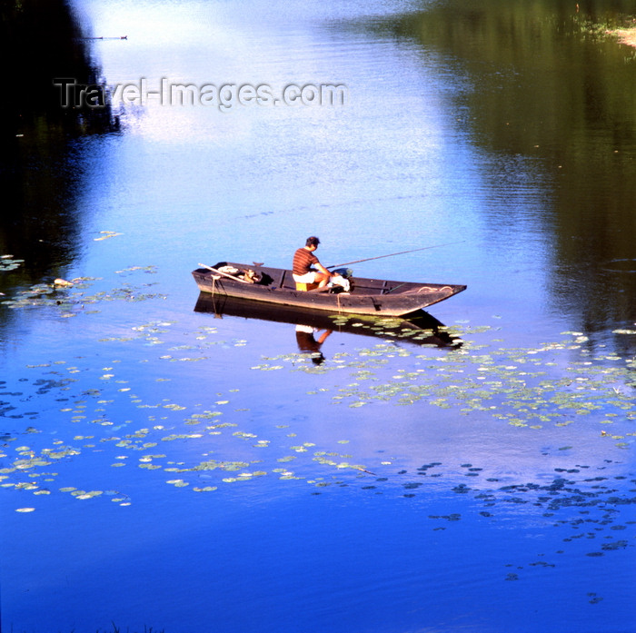 france83: Saumur, Maine-et-Loire, Pays de la Loire, France: angler on a small boat on the Loire river - blue sky reflection - photo by A.Bartel - (c) Travel-Images.com - Stock Photography agency - Image Bank