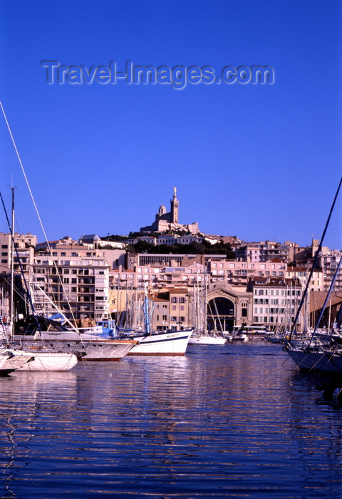 france89: Marseilles, Bouches-du-Rhône, PACA, France: view from the harbour towards Notre-Dame de la Garde basilica - architect Henri-Jacques Espérandieu - Neo-Byzantine style - photo by A.Bartel - (c) Travel-Images.com - Stock Photography agency - Image Bank