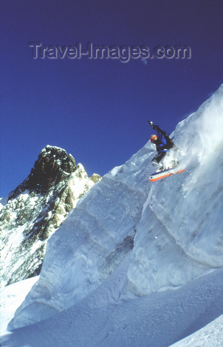 france918: La Grave, Briançon, Hautes-Alpes, PACA, France: off Piste snowboarder jumping on the glacier - photo by S.Egeberg - (c) Travel-Images.com - Stock Photography agency - Image Bank
