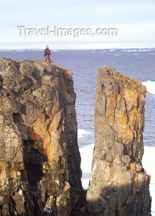 franz-josef10: Franz Josef Land - Wilzcek Land Island: man at cliff edge (photo by Bill Cain) - (c) Travel-Images.com - Stock Photography agency - Image Bank