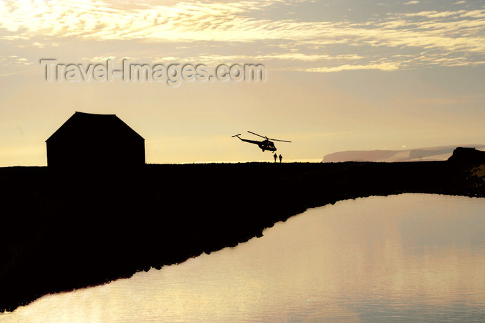 franz-josef34: Franz Josef Land Hut, helicopter & people, Bell Island - Arkhangelsk Oblast, Northwestern Federal District, Russia - photo by Bill Cain - (c) Travel-Images.com - Stock Photography agency - Image Bank