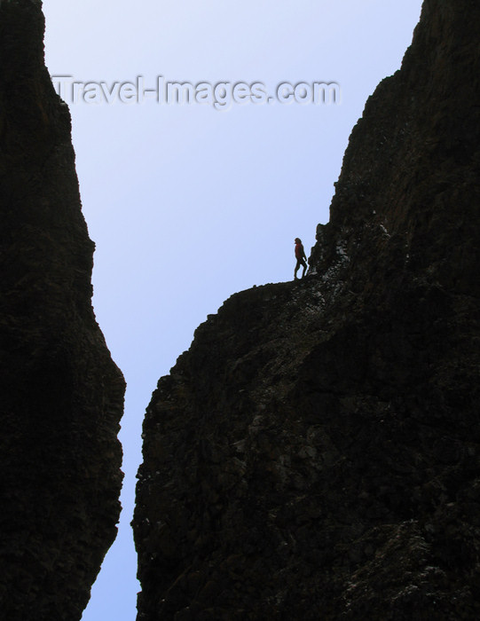 franz-josef53: Franz Josef Land Person climbing twin spires, Cape Tegethoff, Hall Island - Arkhangelsk Oblast, Northwestern Federal District, Russia - photo by Bill Cain - (c) Travel-Images.com - Stock Photography agency - Image Bank