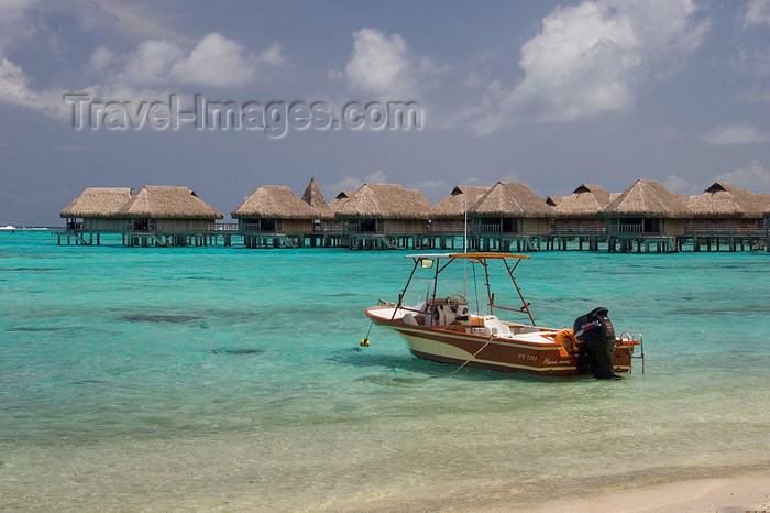 french-polynesia126: Papetoai, Moorea, French Polynesia: lagoon view - boat and overwater bungalows of the InterContinental Hotel - tropical resort - photo by D.Smith - (c) Travel-Images.com - Stock Photography agency - Image Bank