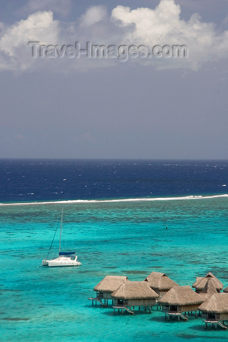 french-polynesia127: Papetoai, Moorea, French Polynesia: InterContinental Hotel - protected lagoon, seen from above - catamaran and overwater bungalows - tropical resort - photo by D.Smith - (c) Travel-Images.com - Stock Photography agency - Image Bank