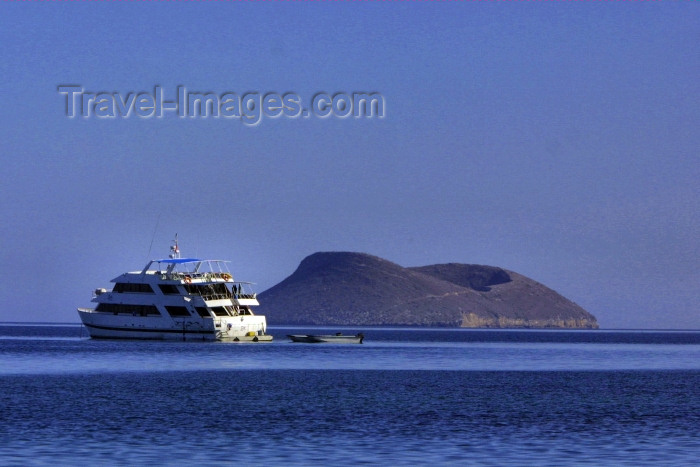 galapagos18: Galapagos Islands - Isla Tortuga: vessel and volcano - only the upper ring of the crater breaches the surface of the Pacific ocean - photo by R.Eime - (c) Travel-Images.com - Stock Photography agency - Image Bank