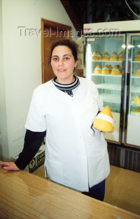 galicia32: Galicia / Galiza - Santiago de Compostela: rapariga vendendo queijo tetilha - young lady selling tetilla cheese - photo by M.Torres - (c) Travel-Images.com - Stock Photography agency - Image Bank