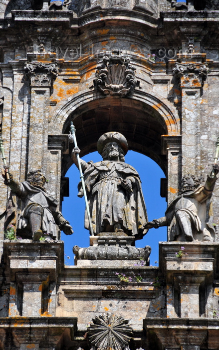 galicia94: Santiago de Compostela, Galicia / Galiza, Spain: the Cathedral - statue of St. James the Great in the center of the gable, with his two disciples Athanasius and Theodomir, represented as pilgrims - photo by M.Torres - (c) Travel-Images.com - Stock Photography agency - Image Bank