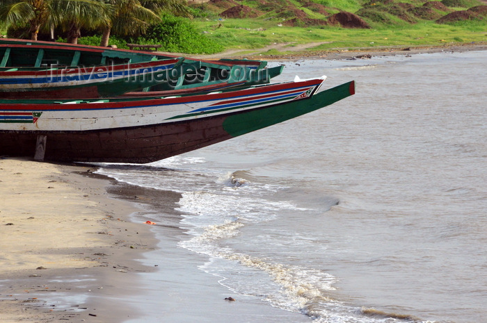 gambia19: Banjul, The Gambia: bows of traditional wooden fishing boats - beach used by fishermen on the south bank of the River Gambia, Banjul island - photo by M.Torres - (c) Travel-Images.com - Stock Photography agency - Image Bank