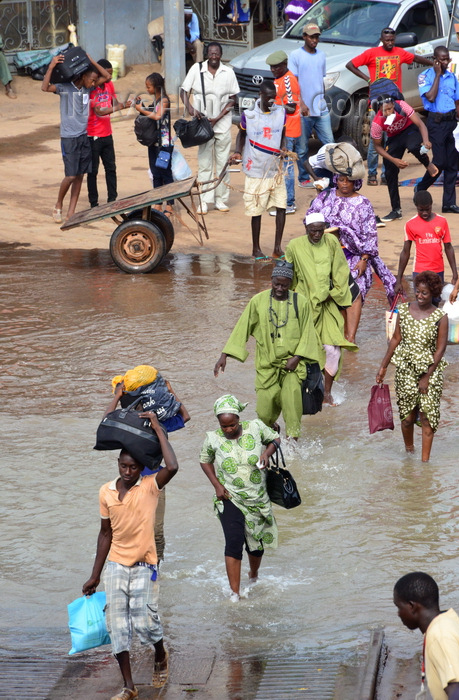 gambia25: Banjul, The Gambia: people cross the water to board the ferry - Banjul ferry terminal - photo by M.Torres - (c) Travel-Images.com - Stock Photography agency - Image Bank