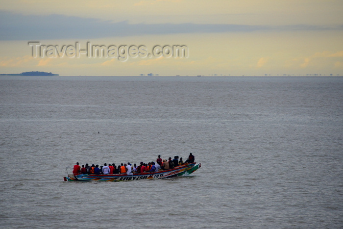 gambia32: Banjul, The Gambia: crowded small boat that provides informal transportation accross the river Gambia, as an alternative to the official ferries - photo by M.Torres - (c) Travel-Images.com - Stock Photography agency - Image Bank