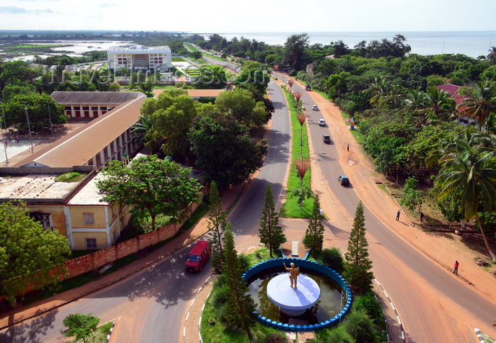 gambia52: Gambia, Banjul: start of the Banjul Serrekunda Highway - Gambia High School, National Assembly and Tanbi wetlands on the left and the Atlantic Ocean on the right - seen from Arch 22 - photo by M.Torres - (c) Travel-Images.com - Stock Photography agency - Image Bank