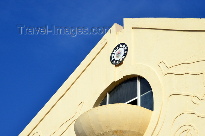 gambia56: Banjul, The Gambia: balcony and clock without hands, hollow-arched pediment of the triumphal arch at the entrance to the capital - Arch 22 - marks the coup d'etat of 1994 - photo by M.Torres - (c) Travel-Images.com - Stock Photography agency - Image Bank