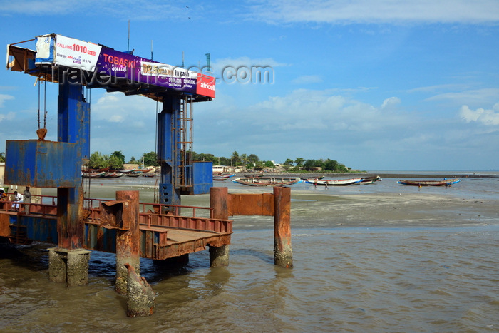 gambia69: Barra, The Gambia: ferry terminal - empty pier with fishing boats in the background - photo by M.Torres - (c) Travel-Images.com - Stock Photography agency - Image Bank