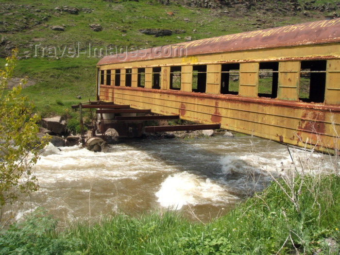 georgia101: Georgia - Mtskheta-Mtianeti region: railway car used as a bridge - photo by L.McKay - (c) Travel-Images.com - Stock Photography agency - Image Bank