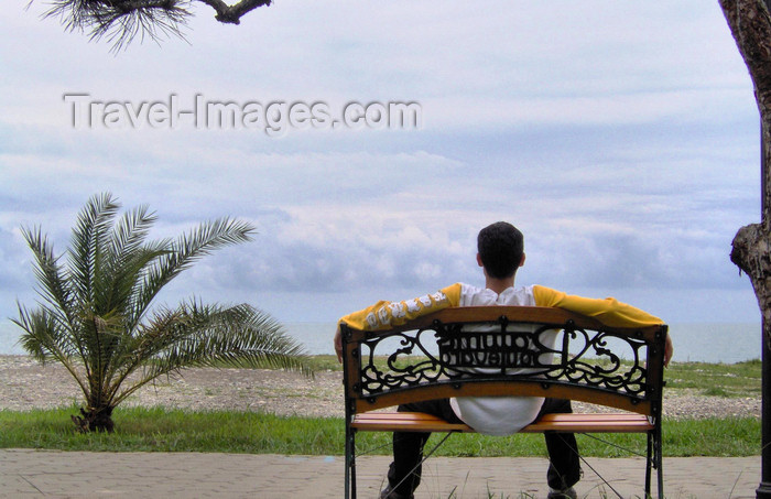 georgia138: Georgia - Batumi, Ajaria: waterfront - man sitting on a bench and looking at Black Sea - photo by S.Hovakimyan - (c) Travel-Images.com - Stock Photography agency - Image Bank