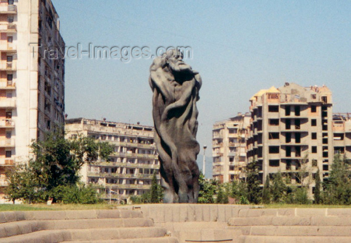 georgia4: Georgia - Tbilisi / Tblissi / TBS: the man and his cocoon - statue - photo by M.Torres - (c) Travel-Images.com - Stock Photography agency - Image Bank