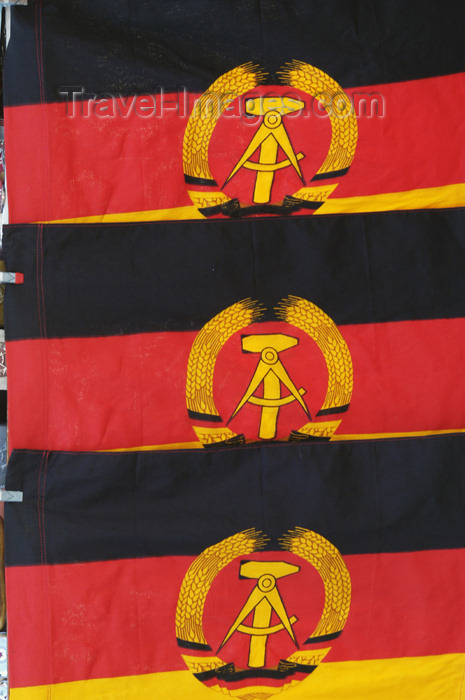 germany273: Germany - Berlin: flags of the former GDR are sold as souveniers by traders at Checkpoint Charlie - nostalgia - photo by W.Schmidt - (c) Travel-Images.com - Stock Photography agency - Image Bank