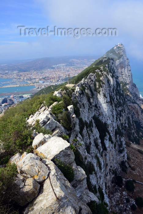 gibraltar46: Gibraltar: view along the ridge and cliff of the Rock towards Middle Hill - La Linea in Spain in the background - Upper Rock Nature reserve - photo by M.Torres - (c) Travel-Images.com - Stock Photography agency - Image Bank