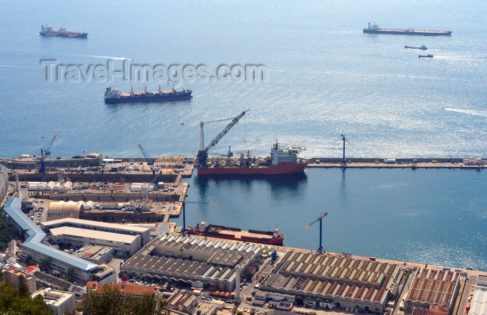 gibraltar57: Gibraltar: harbour area - warehouses and main wharf - pipe-laying ship -  photo by M.Torres - (c) Travel-Images.com - Stock Photography agency - Image Bank