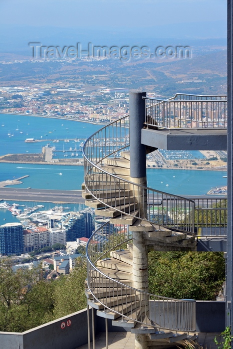 gibraltar58: Gibraltar: spiral stairs at the cable car summit station with the airport and La Linea in the background - photo by M.Torres - (c) Travel-Images.com - Stock Photography agency - Image Bank