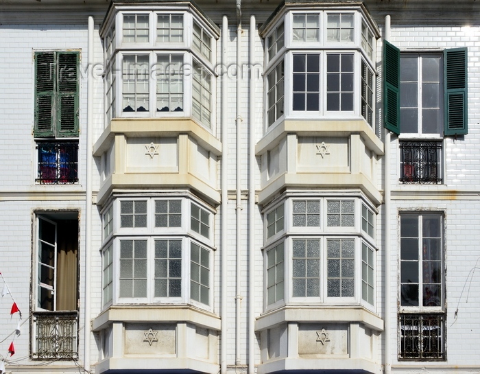 gibraltar72: Gibraltar: oriel windows with stars of David on Main Street - the territory hosts a thriving Jewish community - photo by M.Torres - (c) Travel-Images.com - Stock Photography agency - Image Bank