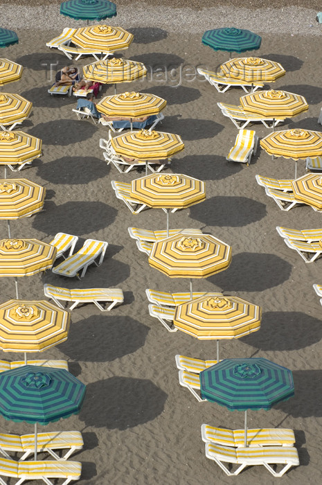 greece308: Greece, Rhodes, New Town: beach umbrellas form geometric patterns on the beach of Rhodes' New Town - (c) Travel-Images.com - Stock Photography agency - Image Bank