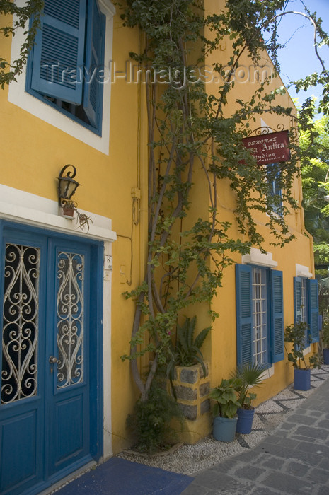 greece356: Greece, Dodecanese Islands, Rhodes: colourfull, bougainvillea-clad house in New Town - (c) Travel-Images.com - Stock Photography agency - Image Bank