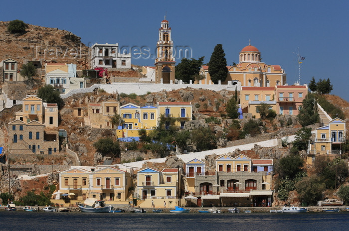 greece444: Greek islands - Dodecanes archipelago - Symi island - Symi town - houses and church on the waterfront - photo by A.Stepanenko - (c) Travel-Images.com - Stock Photography agency - Image Bank