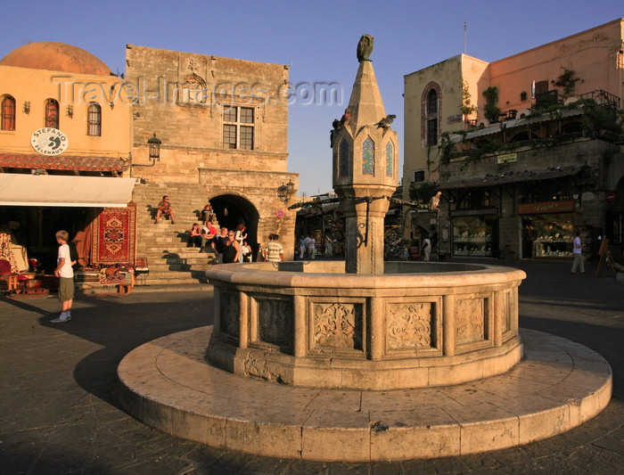 greece80: Greece - Rhodes island - Rhodes city - Old Town - Plateia Ippokratous - medieval fountain - photo by A.Stepanenko - (c) Travel-Images.com - Stock Photography agency - Image Bank