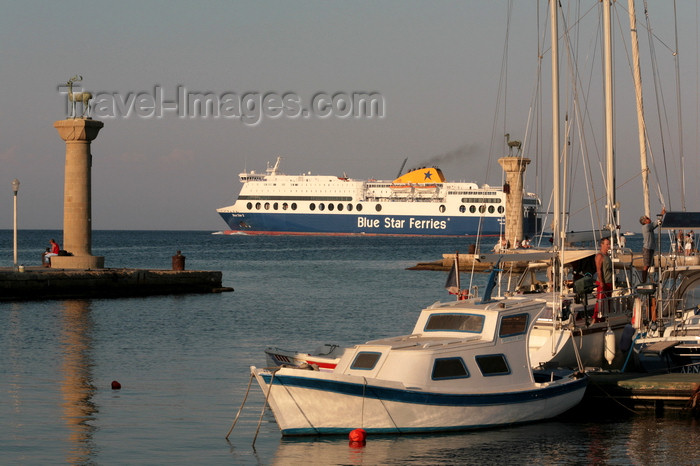 greece83: Greece - Rhodes island - Rhodes city - Mandraki Harbour - columns at the entrance - photo by A.Stepanenko - (c) Travel-Images.com - Stock Photography agency - Image Bank