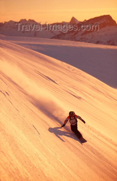 greenland83: Greenland, Apussuit: snowboarder carving turns on steep slope - photo by S.Egeberg - (c) Travel-Images.com - Stock Photography agency - Image Bank
