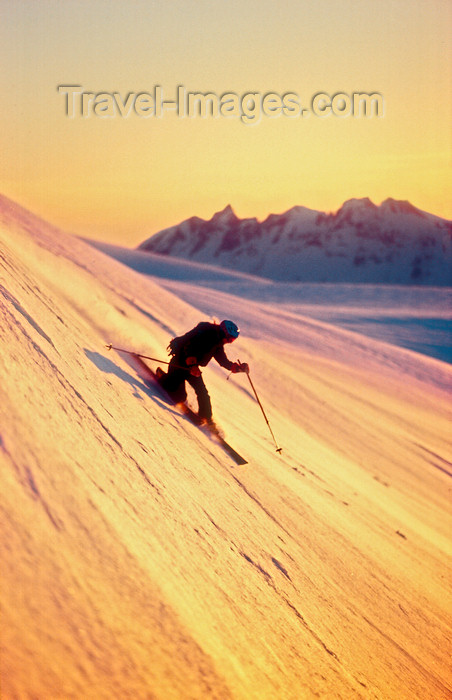 greenland86: Greenland, Apussuit: Telemark skier carving turns on steep slope - photo by S.Egeberg - (c) Travel-Images.com - Stock Photography agency - Image Bank