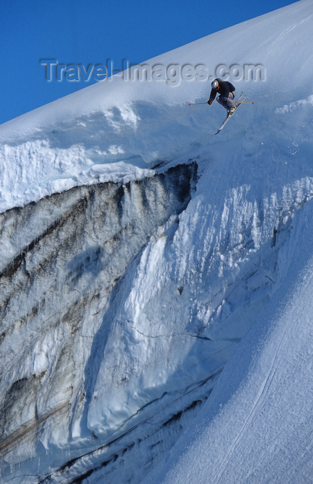 greenland95: Greenland, Apussuit: skier jumping off icewall - photo by S.Egeberg - (c) Travel-Images.com - Stock Photography agency - Image Bank