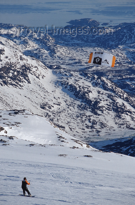 greenland98: Greenland, Apussuit: snowboarder with kite on the glacier - photo by S.Egeberg - (c) Travel-Images.com - Stock Photography agency - Image Bank