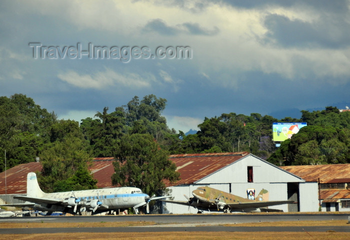 guatemala111: Ciudad de Guatemala / Guatemala city: airport - Douglas DC-4 and DC-3 - hangar and classical aircraft - photo by M.Torres - (c) Travel-Images.com - Stock Photography agency - Image Bank